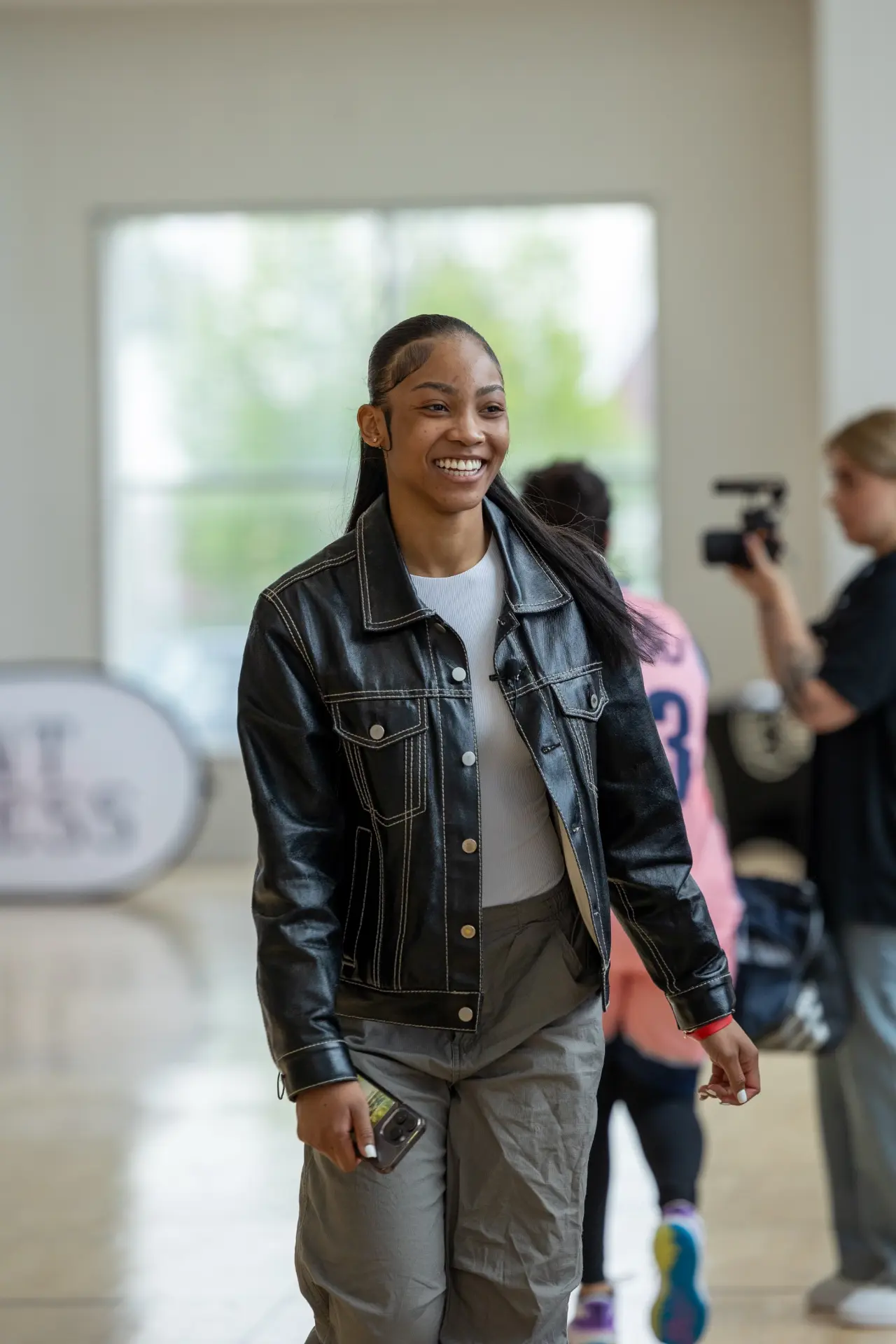 Point Goddess founder walking through an event