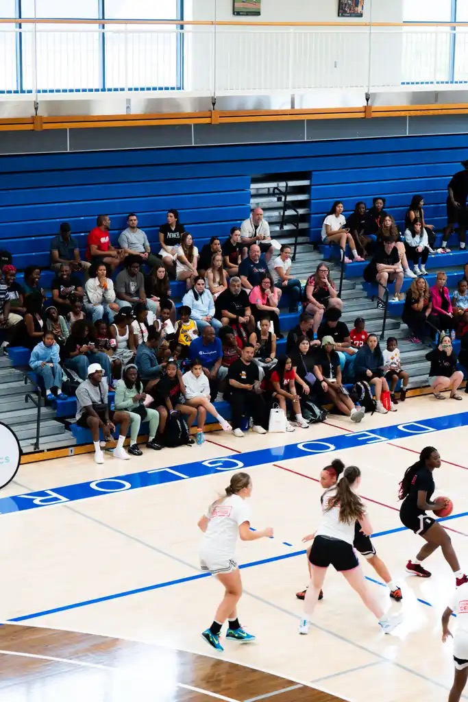 Game action in front of a full crowd of young supporters